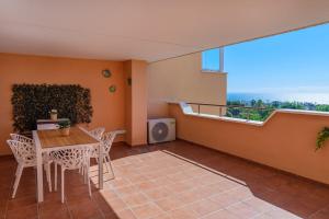 Balkón nebo terasa v ubytování Seaview Golf Doña Julia