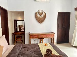 Letto o letti in una camera di Kanda Villa