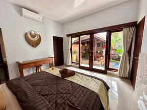Letto o letti in una camera di Kanda Villa