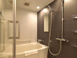 Koupelna v ubytování Izutsu hotel Takasegawa