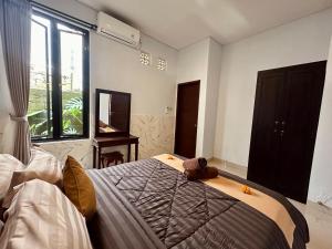 Letto o letti in una camera di Kanda Villa