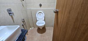 Koupelna v ubytování Hotel Lee Grand
