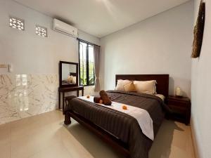 Letto o letti in una camera di Kanda Villa
