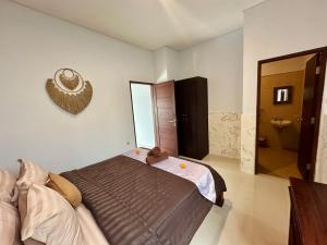 Letto o letti in una camera di Kanda Villa