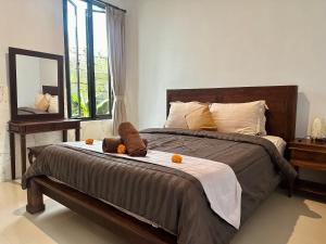 Letto o letti in una camera di Kanda Villa