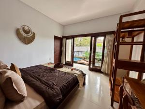 Letto o letti in una camera di Kanda Villa