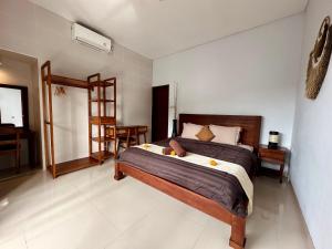 Letto o letti in una camera di Kanda Villa