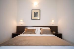 Postel nebo postele na pokoji v ubytování Union Park Hotel