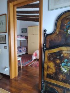 Postel nebo postele na pokoji v ubytování L'Onda
