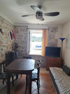 Ένα ή περισσότερα κρεβάτια σε δωμάτιο στο Insel Kaprije Nowak +7 φωτογραφίες