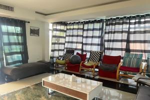 Istumisnurk majutusasutuses BKL Pool Villa Pattaya