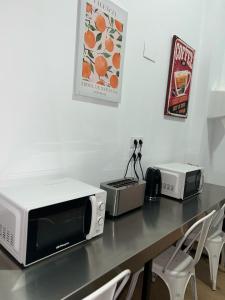 TV a/nebo společenská místnost v ubytování Beach & Arts Hostel Valencia