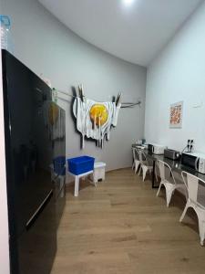 TV a/nebo společenská místnost v ubytování Beach & Arts Hostel Valencia