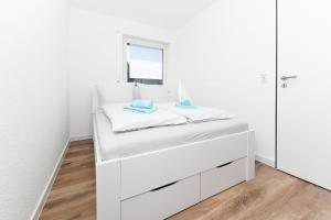 Galeriebild der Unterkunft Ferienwohnungen mit Terrasse im Haus Seekieker in Bensersiel