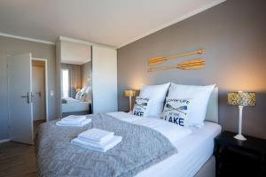 Postel nebo postele na pokoji v ubytování Das Solaris 10 Luxury Beach Apartment mit Balkon, hundefreundlich, individuell