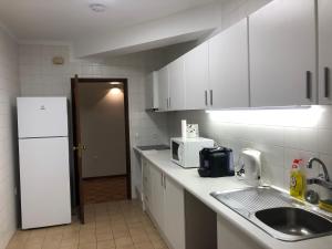 Køkken eller tekøkken på Madorninha Urban Nest + 10 billeder