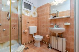 Koupelna v ubytování Apartments Katarina
