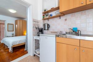 Kuchyň nebo kuchyňský kout v ubytování Apartments Katarina