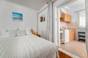Kuchyň nebo kuchyňský kout v ubytování Apartments Katarina