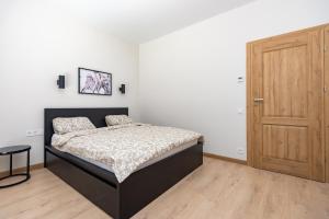 Ένα ή περισσότερα κρεβάτια σε δωμάτιο στο Amber Stone Monciskes