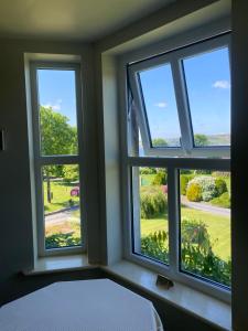 Voodi või voodid majutusasutuse Glendine Country House Wexford toas