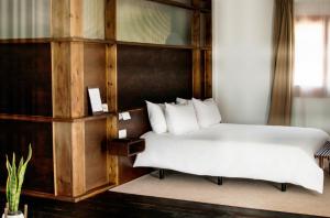 A bed or beds in a room at Casa Boumort