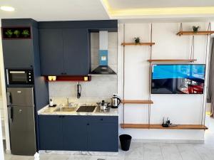 Η κουζίνα ή μικρή κουζίνα στο Central Amman Stunning Views Apt +11 φωτογραφίες