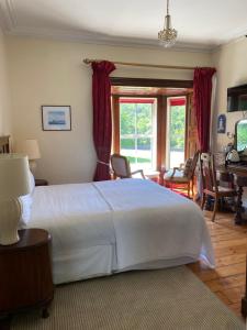 TV a/nebo společenská místnost v ubytování Glendine Country House Wexford