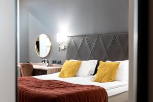 Postel nebo postele na pokoji v ubytování Elite Stora Hotellet Örebro