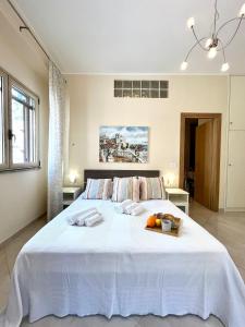Postel nebo postele na pokoji v ubytování Silene Charme Apartment + 24 fotografií