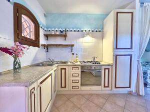 Ảnh trong thư viện ảnh của Mono 4 pax - Terrazza - Piscina & Parcheggio ở Baja Sardinia