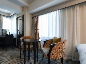 Posezení v ubytování APA Hotel Shimbashi Onarimon
