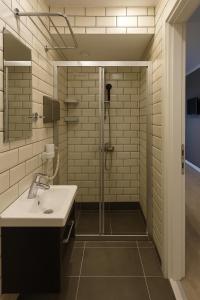 Koupelna v ubytování Utarit Hotel