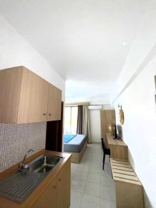 Kuchyň nebo kuchyňský kout v ubytování Sotirakis Hotel