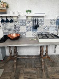 Kuchyň nebo kuchyňský kout v ubytování Casa Daflanna in Salento - Libeccio (monolocale)