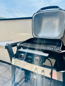 a grill sitting on top of a table at Cielito Hayama in Hayama