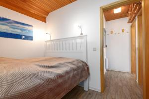 Postel nebo postele na pokoji v ubytování Strandmuschel