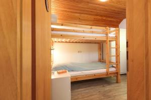 Postel nebo postele na pokoji v ubytování Strandmuschel