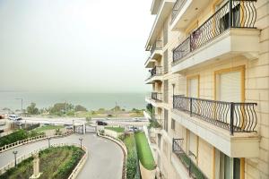 a view of a street from a building at אירופה בוטיק כנרת - דירת 4 חדרי שינה עם נוף לכנרת in Tiberias