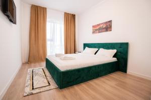 Postel nebo postele na pokoji v ubytování Real Resort
