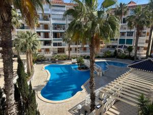 Πισίνα στο ή κοντά στο Joyful Pearl Apartment