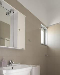 Kúpeľňa v ubytovaní Reina Apartments + 15 fotografií