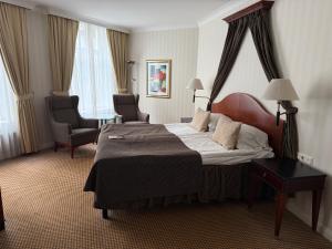 Ένα ή περισσότερα κρεβάτια σε δωμάτιο στο Elite Hotel Mollberg
