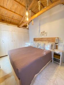 Postel nebo postele na pokoji v ubytování Jenoa, sealight house