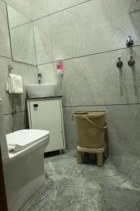 Koupelna v ubytování Hotel Tim Hartins