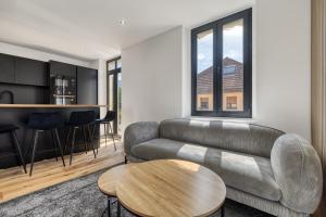 Ruang duduk di La Cosy - chambre en colocation