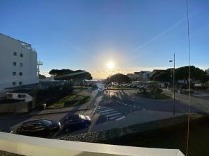 a view of a parking lot with cars parked at Appartement 3 pièces proche de la plage avec parking - FR-1-494-146 in Royan