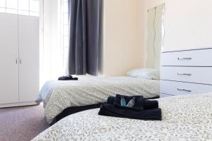 Ένα ή περισσότερα κρεβάτια σε δωμάτιο στο Brookvale Guest House Room 1