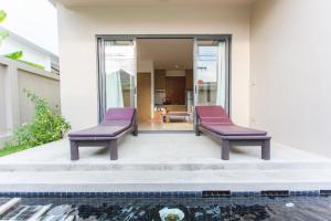 Afbeelding uit fotogalerij van Honeymooner Pool Villa@Seastone in Bang Tao Beach +15 foto's