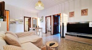 TV a/nebo společenská místnost v ubytování Villa Lounge Paradise